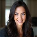 Sophie Clarke, Creative Director, smiling in salon